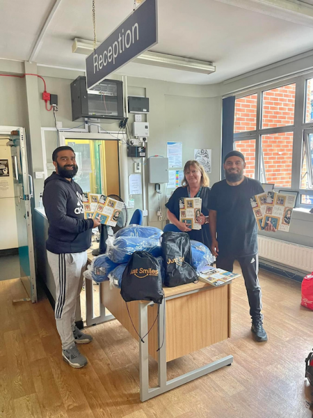 Emdad (right) with volunteers at an east London-based night shelter.  © Emdad Rahman